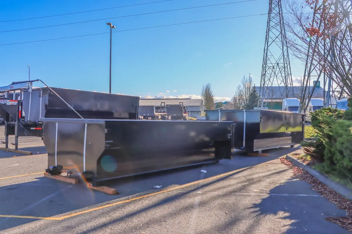 Roll-off dumpster ready for waste disposal at job site for 2 Yard Dumpster Rental in Albion